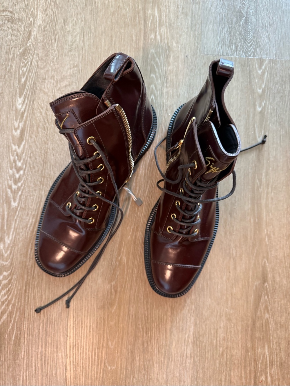 Giuseppe Zanotti Glossy Burgundy Lace-Up Combat Boots with Gold Hardware